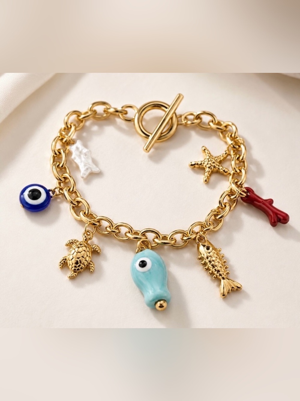 Gold Tone Ocean Themed Charm Bracelet